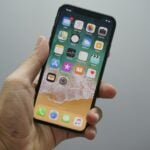 person holding space gray iPhone 7