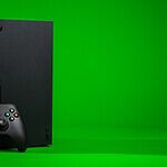 black xbox one console with controller
