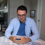 man in white dress shirt and blue necktie
