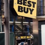 The image shows the exterior of a best buy store.