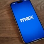 A close up of a cell phone on a table