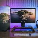 black and gray laptop computer on brown wooden table