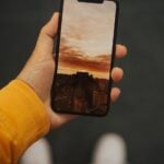 person holding black iphone 5