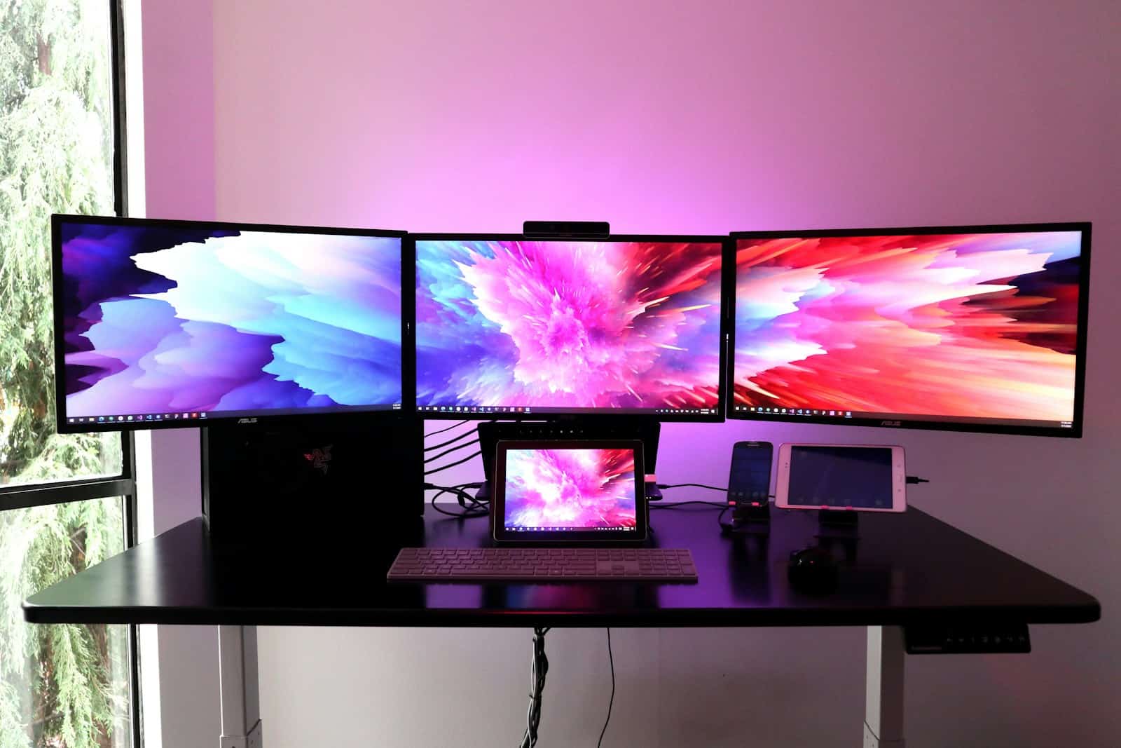 black flat screen tv on white wooden table