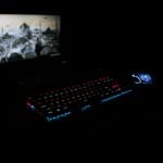 black flat screen computer monitor turned on near black computer keyboard