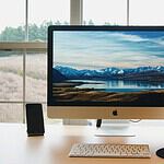 silver iMac ad wireless keyboard